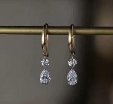 14kt Gold Drilled Dangle Drop .80cttw Diamond Earrings. DEF, VS2.