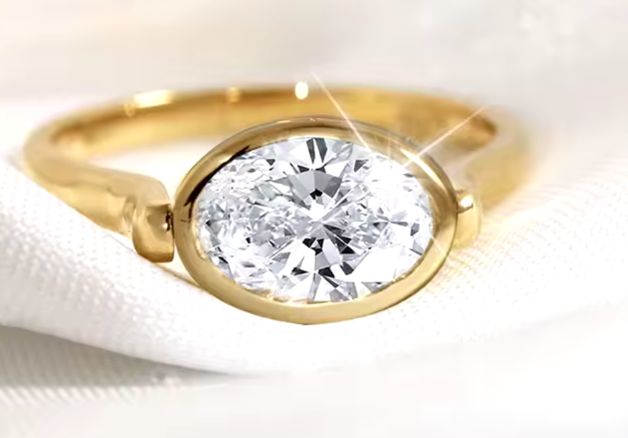 14kt Gold Oval Diamond Bezel Set Ring 1 carat